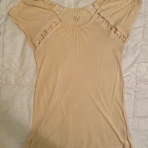 Beige shirt with classy cutouts